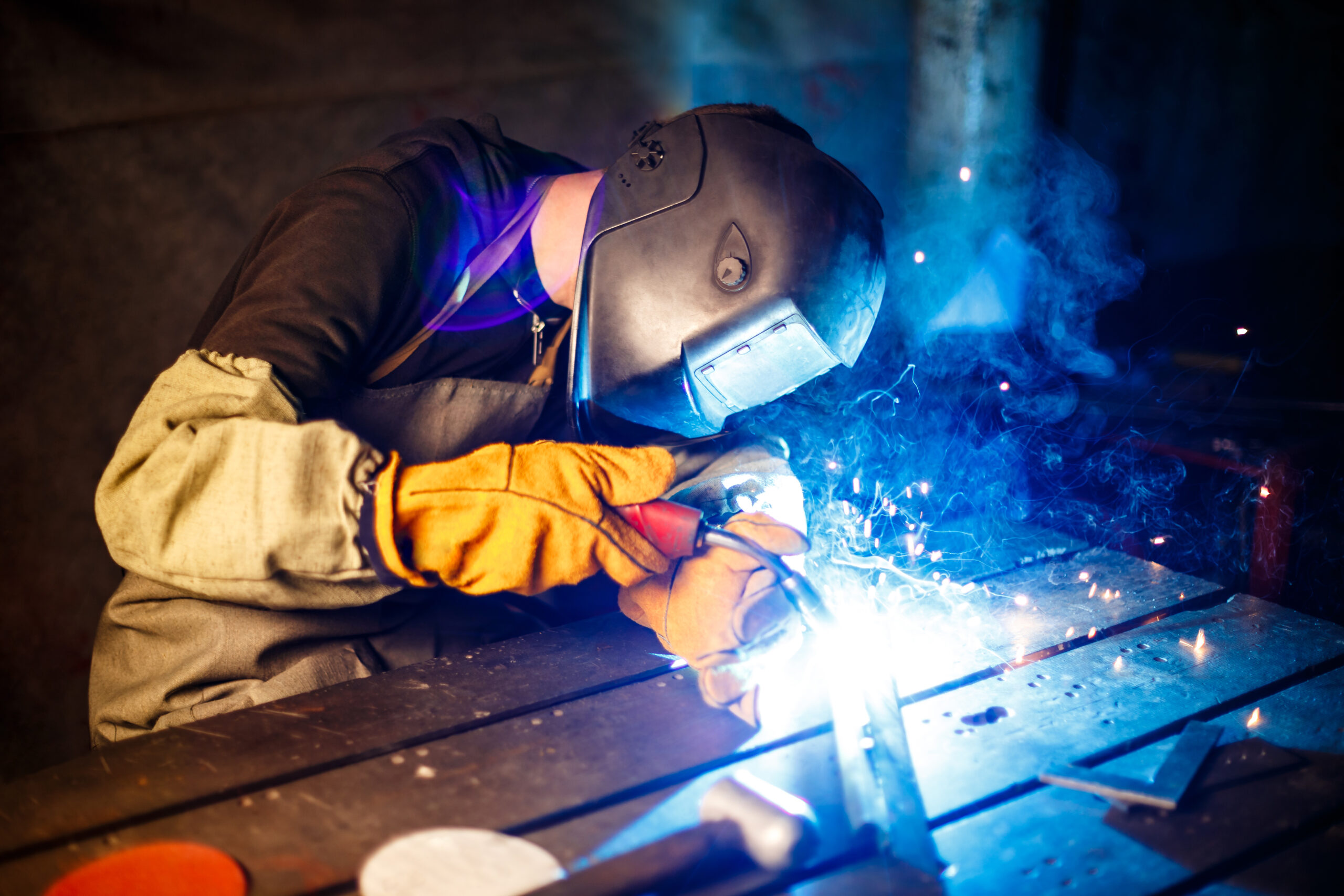 Cutting metal with plasma equipment on plant.